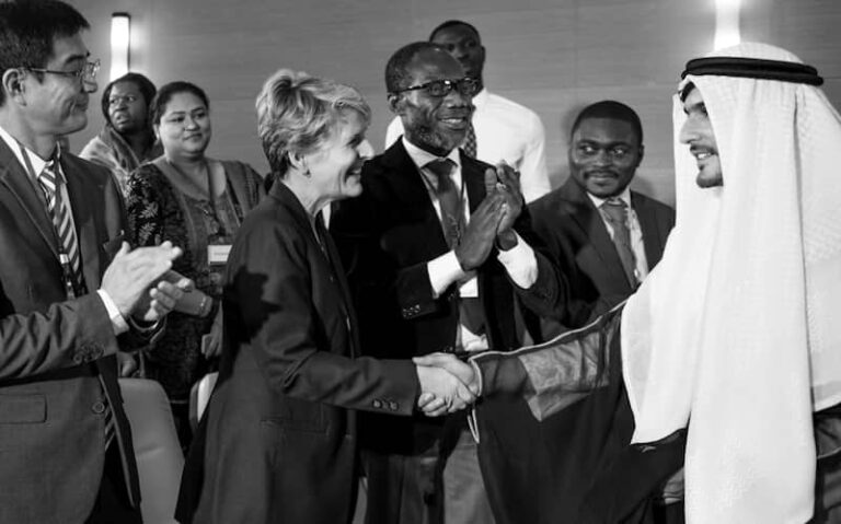 Business handshake in Africa symbolizing Nigeria’s exit from FATF grey list and renewed investor confidence